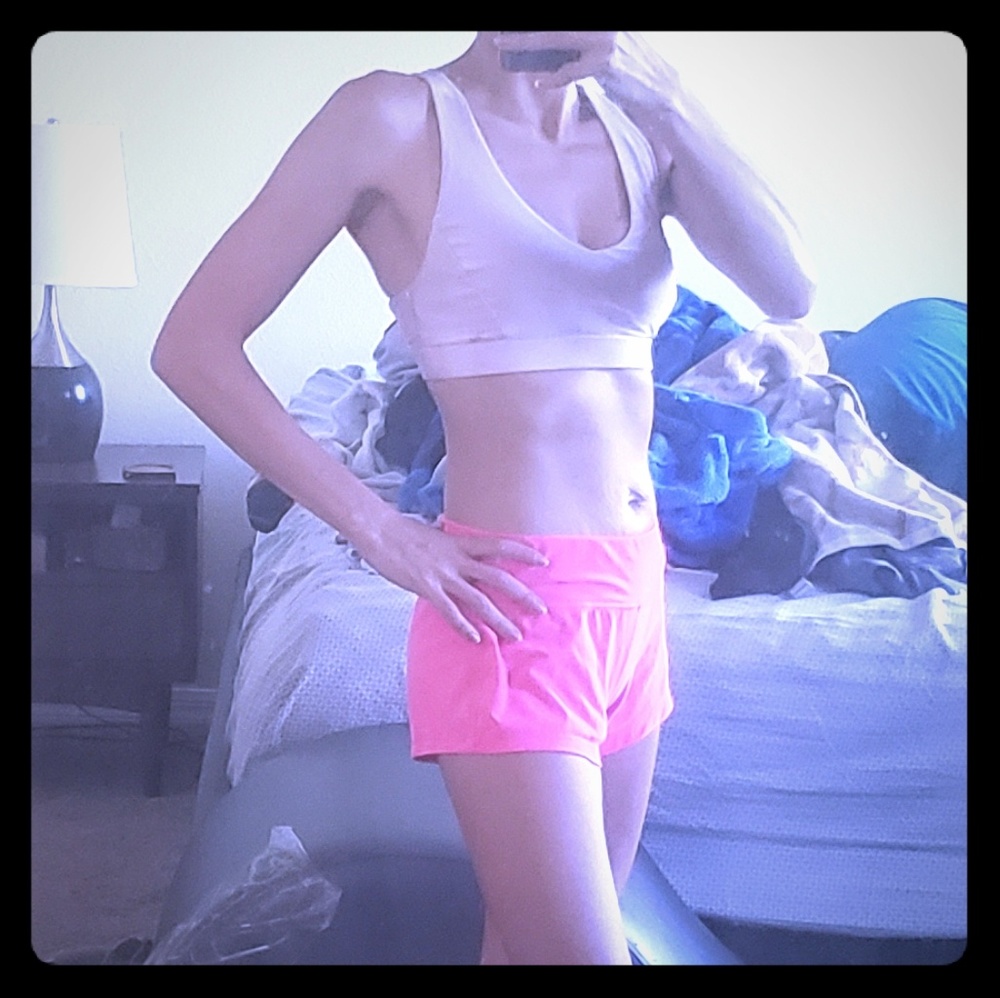 Athletic wear hot pink shorts blush sports bra top